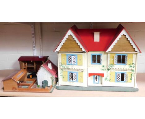 A child's play set, comprising Amanda's Farm play set, a diecast tractor and a doll's house with painted pitch top and swing 