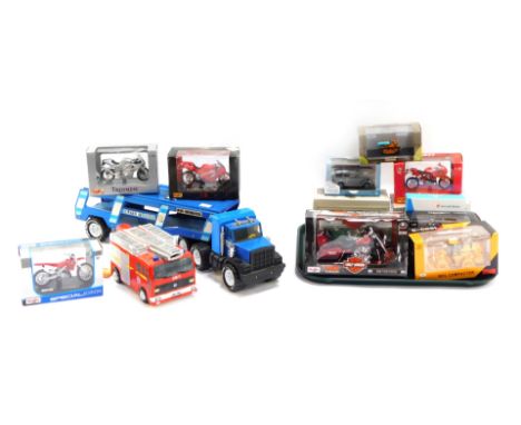 Diecast vehicles, comprising a Big Movers transport, pottery fire engine, Harley Davidson motorcycle, Welly Triumph, Seacal a