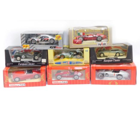 Eight diecast cars, 1:18 scale, comprising three Tonka Polistils, a Polistil Maserati 250F, a GT Racing Mercedes CLK GTR, Ert