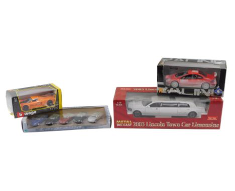 A group of diecast vehicles, boxed, comprising Burago Maserati MC12, 1:24 scale, cased set of five Cararama vehicles, a metal