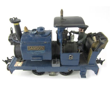 A Playmobil Samson G scale locomotive, with driver in blue.