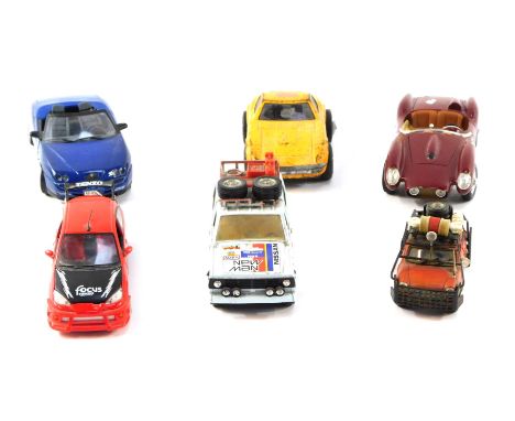 A group of diecast vehicles, comprising Ferrari, 1:18 scale, 1958 Testarossa 250,  Maisto Alfa Romeo Spider, Maisto Ford Focu