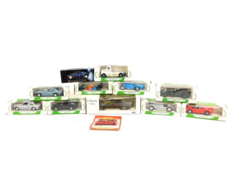 Diecast vehicles, comprising Orion Ghia Ford, Typhoo Tea E1 London tram, Bentley, Volve racing turck, Porsche 944, Jaguar XJS