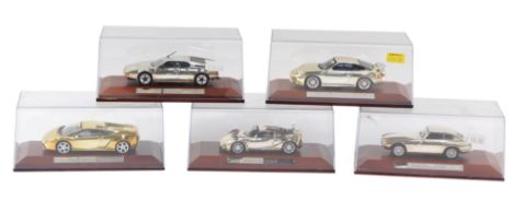 Five chrome finish diecast models, comprising the Pegaso Z-102, Porsche 011 GT3, Lamborghini Gallardo, BMW M1 and the Lotus E