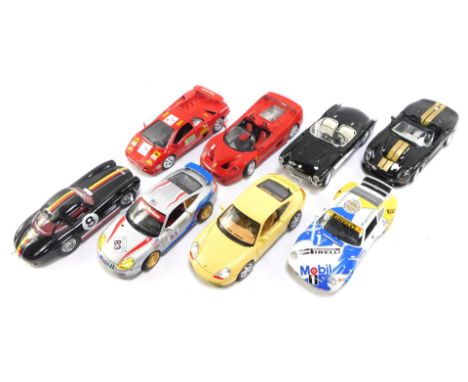 Eight diecast cars, comprising Burago Mercedes Benz 300SL, Burago Porsche 911 Carrera (x3), Burago Chevrolet Corvette 1957, L