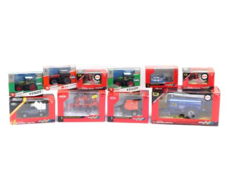 Diecast agricultural vehicles, comprising a Kuhn VV2160 round baler, a Kuhn Gyrotedder GF13012, a Britains diecast model and 