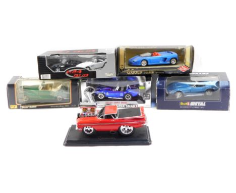 A group of diecast vehicles, 1:18 scale, comprising Maisto Mercedes Benz 300S, Shelby Cobra Super Snake, a Revell 69 Corvette