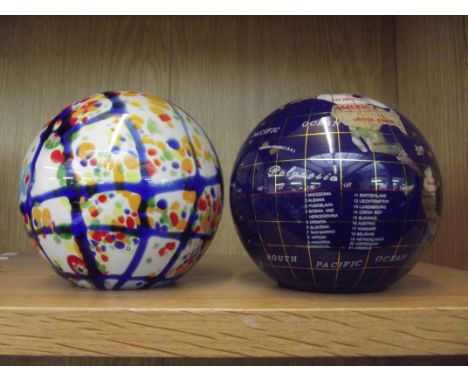 Hardstone globe together with a heavy glass paper weight