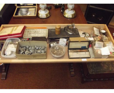 A large collection of watchmakers tools and parts