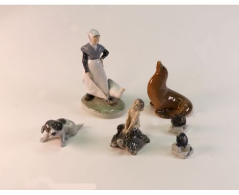 A collection of six pieces of Royal Copenhagen porcelain, faun on tortoise, no. 858; seal, no. 1441; mouse on sugar lamp, no.