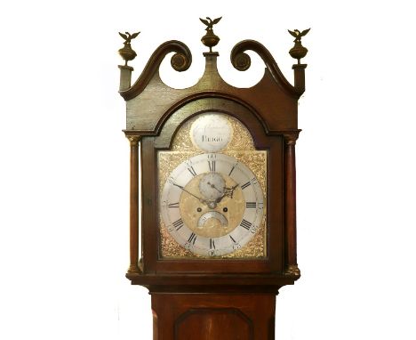 George Clapham Brigg: A George III oak and mahogany longcase clock, the hood with broken swan neck pediment and brass orb and