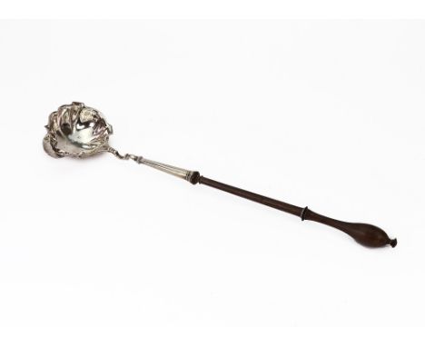 A George III silver punch ladle, William Darker, London 1754, with lobed oval single lipped bowl, engraved with a crest, late