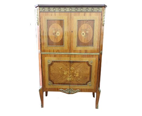 A cocktail cabinet disguised as a reproduction Louis XVI style kingwood rosewood inlaid gilt metal mounted secrétaire à abatt