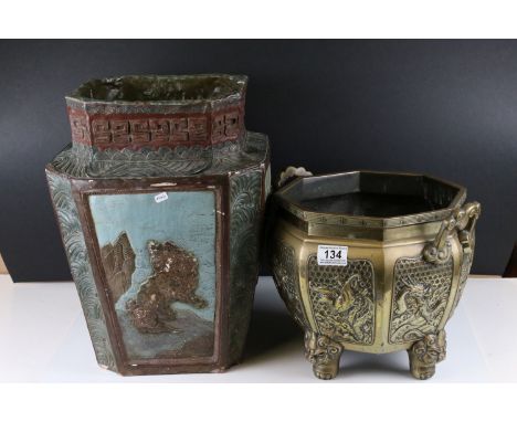 Oriental octagonal brass planter decorated with dragons &amp; birds of paradise, with mythical lion's feet, together with an 