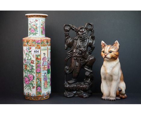 A contemporary Chinese ceramic vase together with a Chinese carved wooden figure and a ceramic cat. 