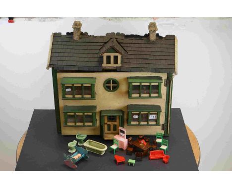Scratch Built Dolls House in the form of a 1930's Cottage, 67cms wide x 52cms high together with a quantity of Dolls  House F