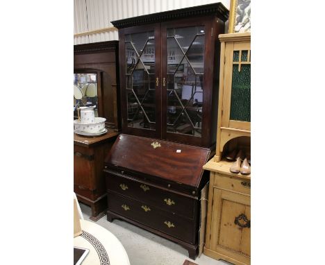 19th century Mahogany Bureau Bookcase, the upper section with astragel glazed doors, above a drop front with fitted interior,
