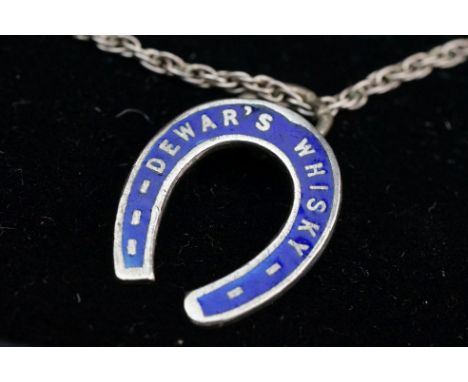 Silver and enamel necklace, the pendant in the form of a horseshoe, inscribed ' Dewars Whisky ' 