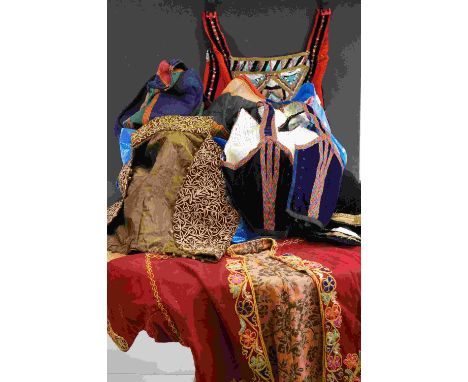 A bag of vintage clothing to include a cloak, embroidered waistcoat, bodice etc.. 