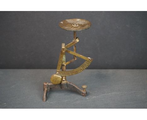 A set of early 20th century brass postal scales. 