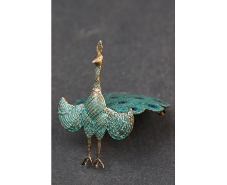 A vintage Siam silver and enamel Peacock brooch with hinged tail. 