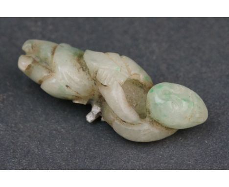 A vintage oriental caved jade netsuke 