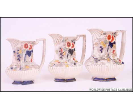 A collection of  ceramic  jugs to include Victorian graduating Imari pattern jugs x 3 along with 6 others to include chintz p