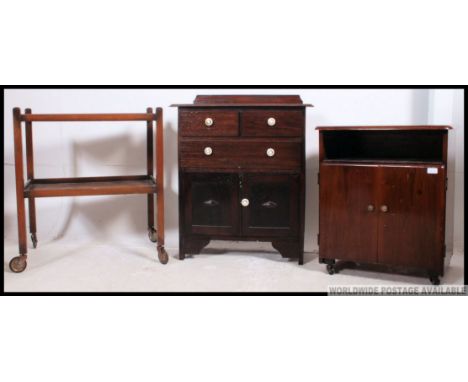 A 1930's Art Deco cabinet together with a trolley and 1950's vintage cabinet raised on castors. H75 x W66 x D45cm 