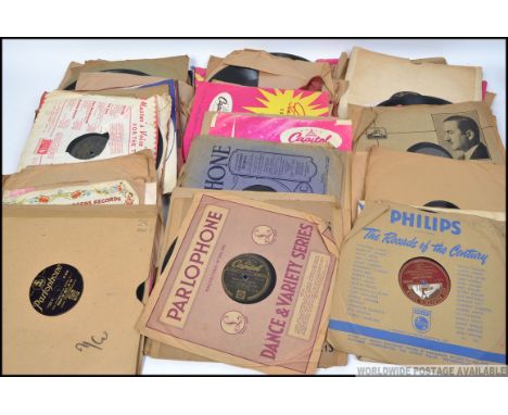 A collection of vintage 78rpm records of different genres to include swing, jazz, blues etc on various lables such as John Bu