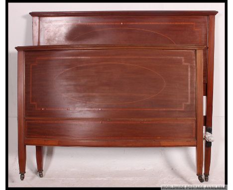 An Edwardian mahogany inlaid bow front double bed complete with the rails ( not showing )  Matching washstand and dressing ta