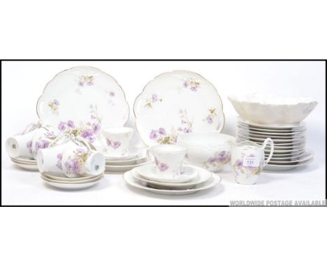 A beautiful 20th century chintz pattern tea service. Of czech origin being stamped to base comprising, cups, saucers, bowls, 