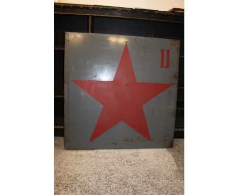 A vintage industrial military metal military panel, made from  steel with a military grey background, over painted with a lar