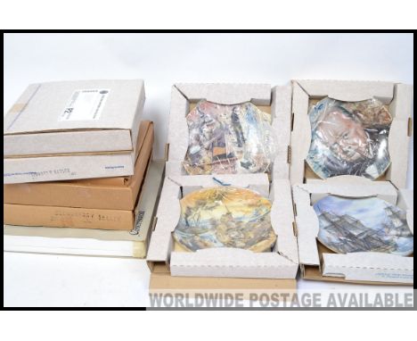 A collection of boxed collectors plates to include 4 Royal Worcester Churchill plates , Russian plates etc..