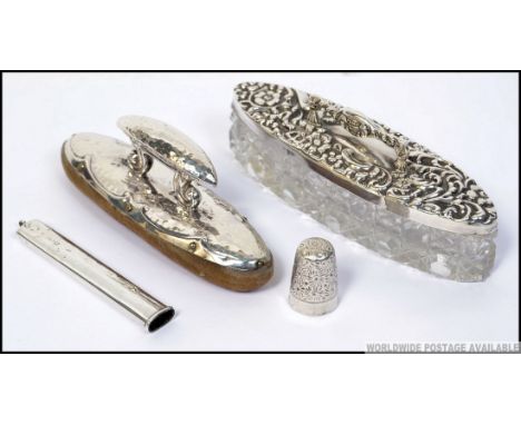 A collection of silver  hallmarked items to include a silver thimble by James Fenton with assay marks for Birmingham dated 18