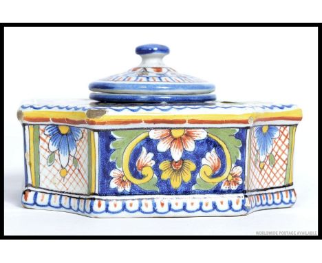An Italian Faience ceramic inkwell, complete with inner well and lid. Beautifully hand painted in typical form.  W12cm 