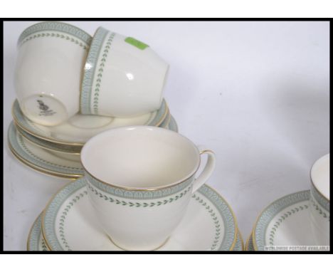 A Royal Doulton Berkshire pattern part tea service, comprising of; six cups, six saucers, and six side plates. Each marked to