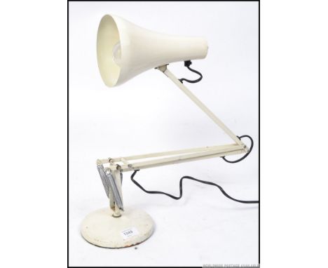 A vintage retro 1960's / 1970's Herbert Terry Anglepoise desk lamp in white, having a circular base