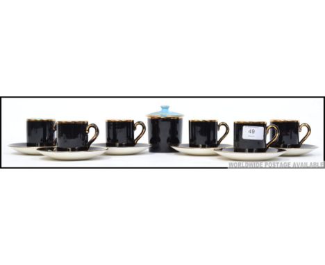 A set of six Palissey  ' Madeleine ' coffee cans with matching saucers, finished with 22ct gold