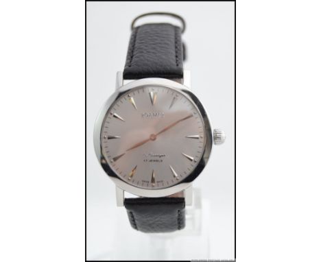 A gentlemans Roamer ' La Classique ' 17 jewels swiss vintage gentlemans wristwatch. The face with spiked baton numerals and f