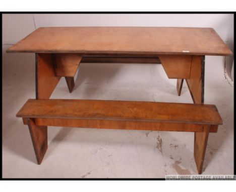 A vintage mid 20th century scouts hut breakdown tavern style garden table, constructed with marine ply and having the ability