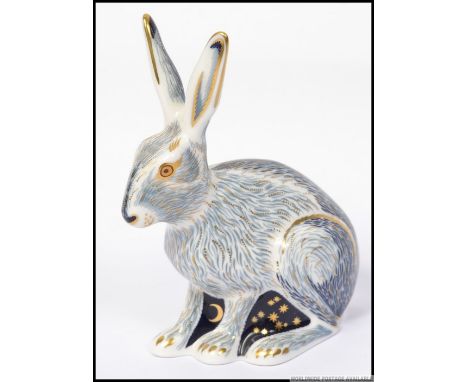 A Royal Crown Derby large paperweight Star Light Hare exclusive to the collectors guild with gold stopper. H14cm 