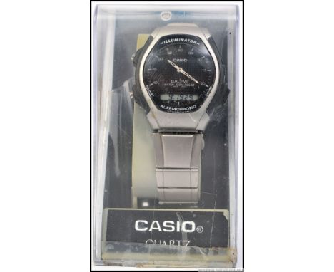 A retro Casio quartz Illuminator Alarmchrono dual time wristwatch complete in the original case together with case and manual