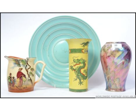 A group of ceramics to include a large Poole pottery plate marked 971 to base , a Royal Doulton series ware jug in gleaners p