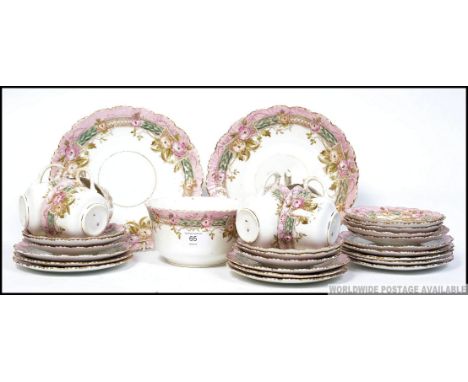 A Victorian chintz Staffordshire part tea service comprising cups, saucers, plates etc
