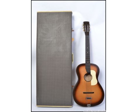 A vintage 1950's / 1960's steel stringed acoustic guitar (AF - split to top) housed within a good period guitar case. 