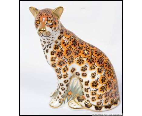 A Royal Crown Derby large paperweight Leopardess limited to 950 pieces with gold button. H14cm 