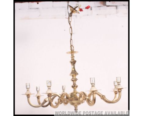 A 20th Century 8 branch brass ceiling hanging light
