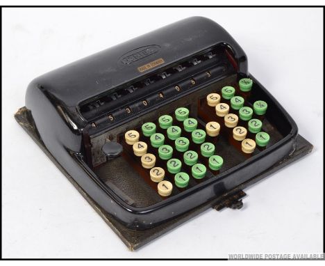 A vintage 20th century German made portable Contex counting machine in metal case
