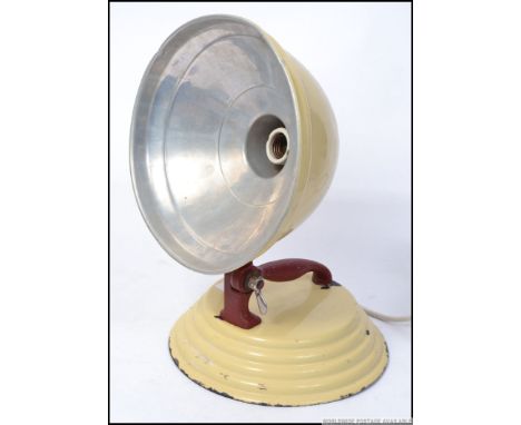 A vintage Barber desktop beige and red heat lamp ideal as a conversion to a desk lamp. Original makers plaque to top