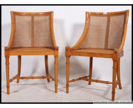 A pair of contemporary matching  20th century framed bergere tub chairs, with  bow seats, on tapering supports. H85 x W50 x D